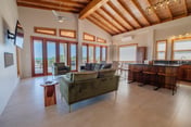 Spacious beachfront retreat with a soaking tub - pool, canoes, dock, & grill