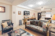 Homey suite in town w WiFi, partial AC, shared pool & veranda - walk to beach
