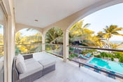 Relaxing condo with shared pool, ocean views, partial AC & WiFi
