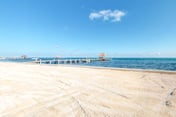 Family-friendly beachfront condo w shared pool & dock, sea view, WiFi & partial AC