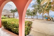 Beachfront condo w Caribbean Sea view, shared pool & dock, partial AC & WiFi