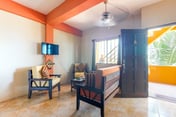 Family-friendly condo with WiFi & partial AC, located just steps from the ocean