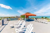 Ideally located apartment w WiFi, partial AC & shared rooftop - steps to the sea