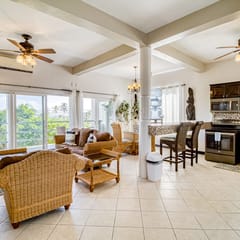 Colorful ocean-view suite with pool & concierge - near dining & town