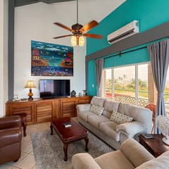 Ocean-view home with balcony, swimming pool & central AC