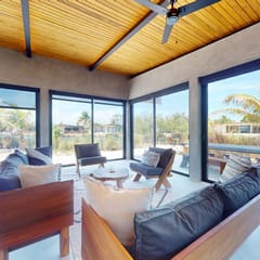 Elegant waterfront villa with private terrace, pool, beach access & 4 en-suites