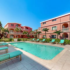 Ocean view condo w shared pool, free WiFi & partial AC - steps from the ocean