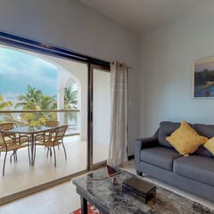 Oceanfront condo with amazing water views, partial AC, WiFi & pool
