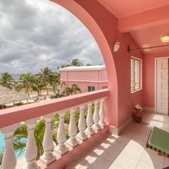Ocean-view condo with outdoor pool, dock, grill, balcony, beach access