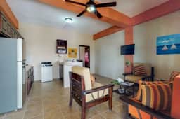 Ideally located apartment w WiFi, partial AC & shared rooftop - steps to the sea