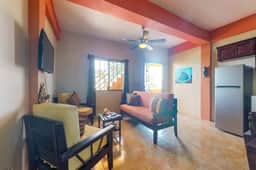 Family-friendly condo with WiFi & partial AC, located just steps from the ocean