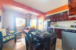 Family-friendly condo with WiFi & partial AC, located just steps from the ocean