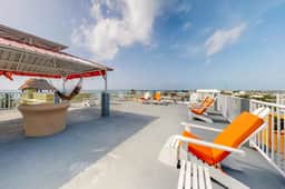Family-friendly condo with WiFi & partial AC, located just steps from the ocean
