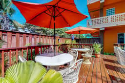 Air-conditioned suite with WiFi and a shared pool & terrace - walk to the beach