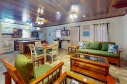 Air-conditioned suite with WiFi and a shared pool & terrace - walk to the beach