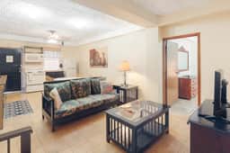 Homey suite in town w WiFi, partial AC, shared pool & veranda - walk to beach
