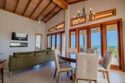 Spacious beachfront retreat with a soaking tub - pool, canoes, dock, & grill