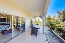 Serene oceanfront condo with shared pool, ocean view, WiFi, & partial AC