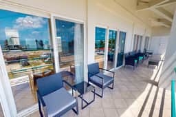 Steps from the sea apartment with shared pool & ocean-view balcony