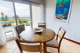 Steps from the sea apartment with shared pool & ocean-view balcony