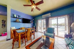 Cozy Waterfront Villa Home w Shared Pool, Water Views, WiFi, & AC - Walk to the Beach