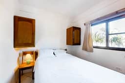 Affordable Suite with WiFi, Partial AC, Shared Rooftop Deck, Pool, and Grill