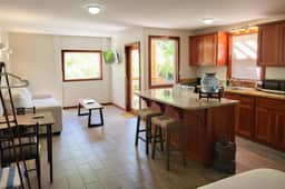 Beachfront abode with well-equipped kitchen - pool, beach, grill, & canoe access
