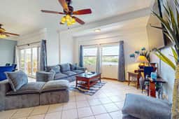 Waterfront villa with outdoor pool, washer dryer, & central AC