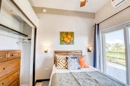 Colorful ocean-view suite with pool & concierge - near dining & town