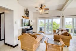 Colorful ocean-view suite with pool & concierge - near dining & town
