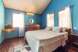 Comfortable home w casual island vibes, WiFi & partial AC - near the beach & town