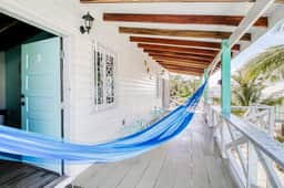 Tropical studio with hammock, shaded balcony, & enclosed yard