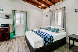 Tropical studio with hammock, shaded balcony, & enclosed yard