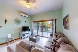 Relaxing condo with shared pool, ocean views, partial AC & WiFi