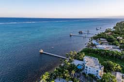 Relaxing condo with shared pool, ocean views, partial AC & WiFi