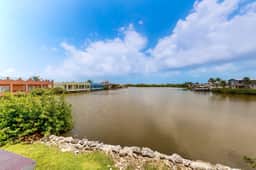 Caribbean condo with ocean view, on-site pool, & private balcony