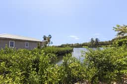 Charming lagoon front apartment with kayaks, SUPs, & nearby beach