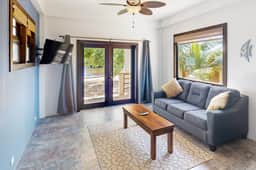 Beachfront suite with reef views - pool, bikes, canoes, dock, and grill access