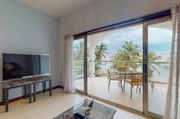 Oceanfront condo with amazing water views, partial AC, WiFi & pool