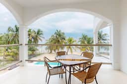 Oceanfront condo with amazing water views, partial AC, WiFi & pool