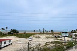 Ocean-view home with balcony, swimming pool & central AC