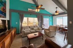 Ocean-view home with balcony, swimming pool & central AC