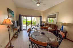 Colorful oceanfront condo with shared pool and jetted tub