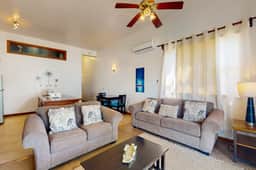 Charming Apartment with Idyllic Waterfront Views and Outdoor Pool Access