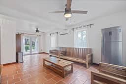 Beachfront home with dock, deck, hammocks, strong WiFi, AC & sea view