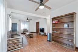 Beachfront home with dock, deck, hammocks, strong WiFi, AC & sea view