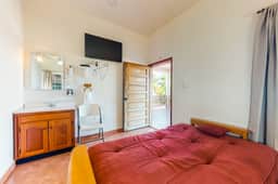 Charming studio w ocean view, deck, partial AC & WiFi - short walk to the beach