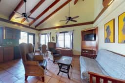 Oceanfront condo with shared pool, sea view, central AC & WiFi - walk to the beach