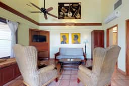 Oceanfront condo with shared pool, sea view, central AC & WiFi - walk to the beach
