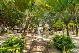 Tranquil ocean-view escape with shared pool, beach access, AC, & free wifi